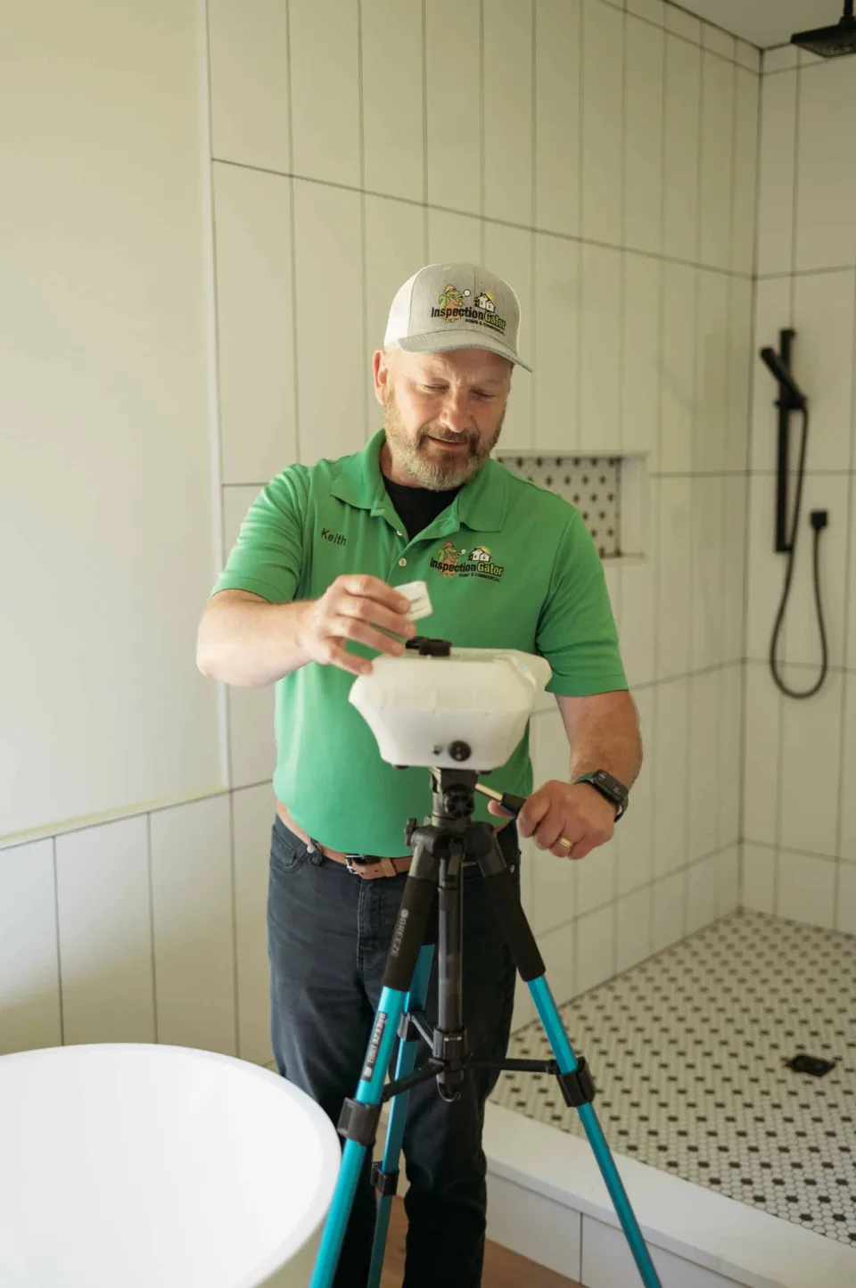 EnviroGator technician collecting an air sample